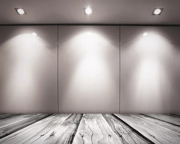 Wall with light sources and wooden floor — Stock Photo, Image