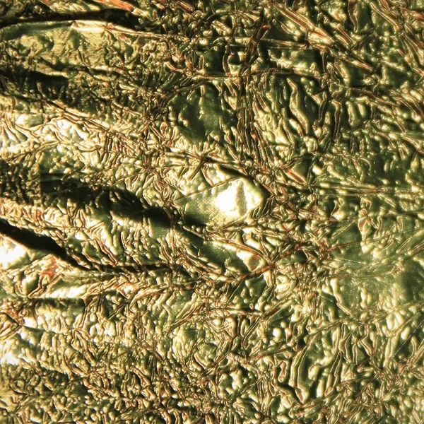 Altın folyo kırık yüzey — Stok fotoğraf