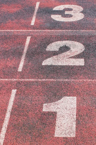 Números en pista de atletismo —  Fotos de Stock