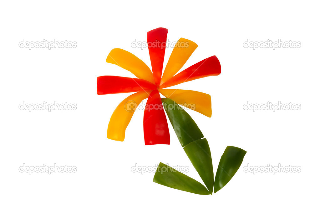 Sliced red, yellow and green pepper as a flower on a white backg