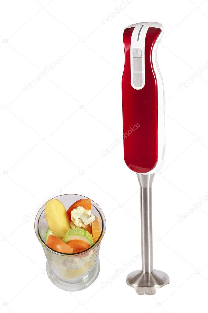 Small electric blender and fresh fruits
