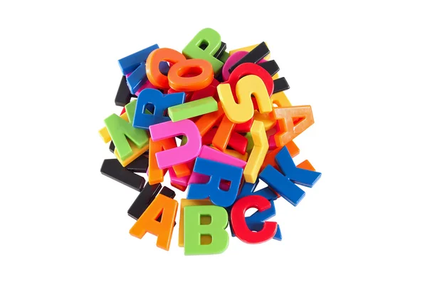 Colorful symbols heap of alphabet. Education concept. Isolated o — Stock Photo, Image