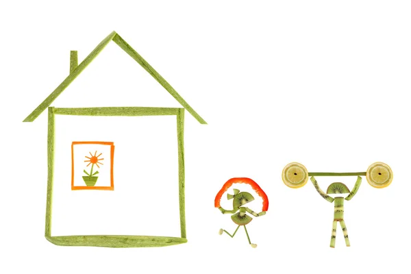 Alimentação saudável. Casa e pessoas pequenas engraçadas feitas de vegetabl — Fotografia de Stock