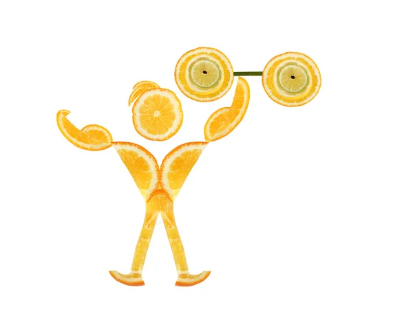 Makan yang sehat. Pria kecil lucu yang terbuat dari irisan jeruk meningkat — Stok Foto