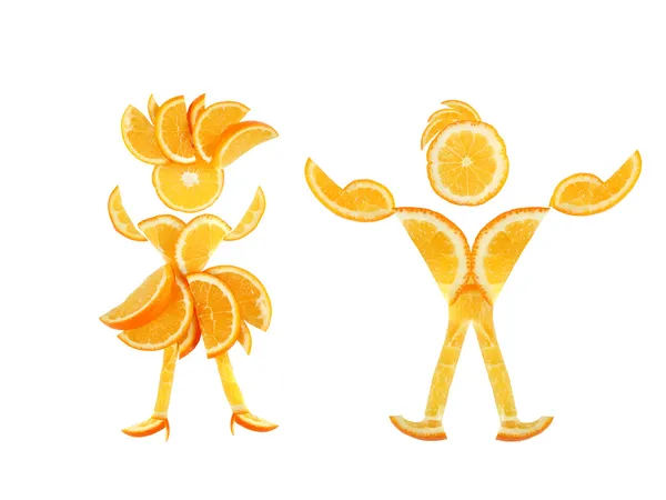 Alimentação saudável. Pequeno par engraçado feito das fatias de laranja . — Fotografia de Stock