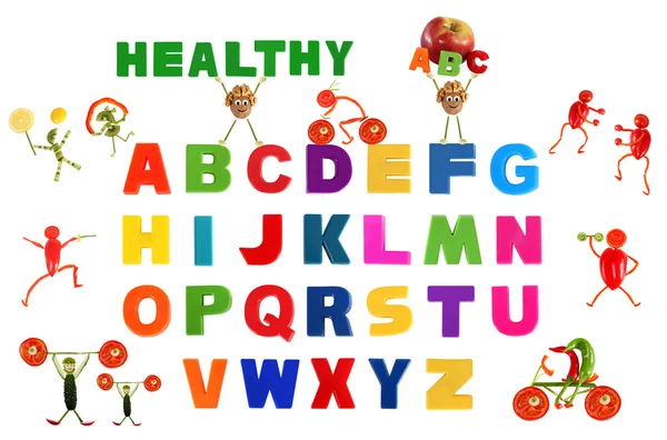 Alphabet written in multicolored plastic kids letters — Stock Photo, Image