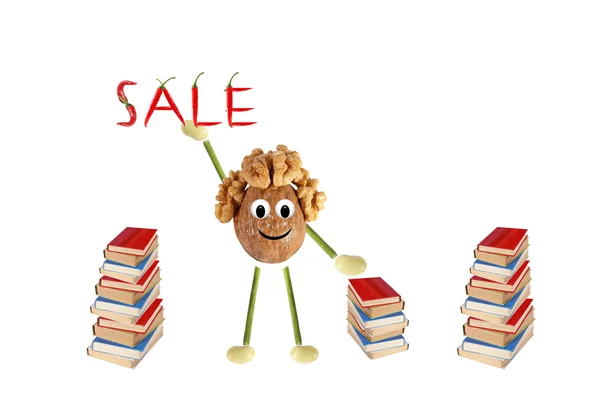Funny little man of the walnut proposes the sale of books — Stock Photo, Image