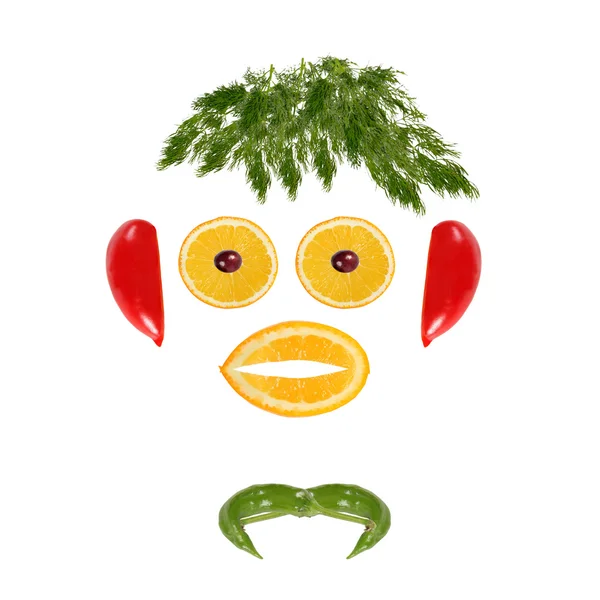 Zdravé stravování. Legrační obličej ze zeleniny a ovoce — Stock fotografie