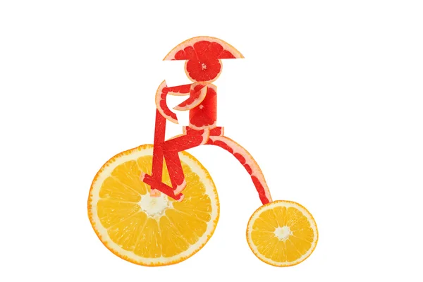 Alimentação saudável. Bicicleta vintage engraçado feito das fatias de laranja w — Fotografia de Stock