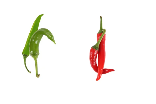 Set chilipepertjes geïsoleerd op wit. — Stockfoto