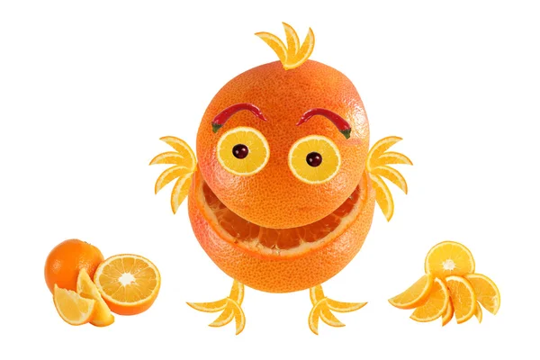 Little funny laughing orange, like chicken, standing near Orange — Stock Photo, Image