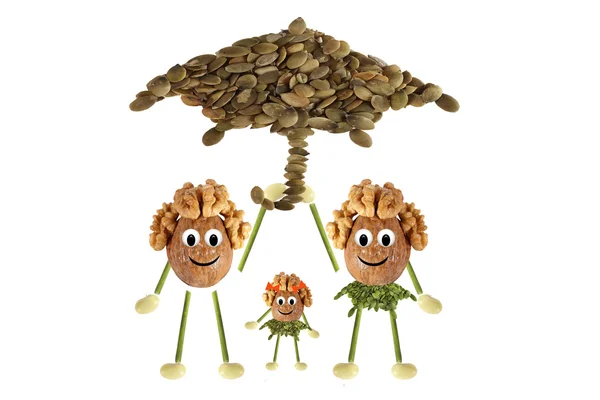 Family nuts under the umbrella — Stock Photo, Image