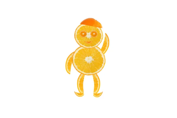 Sağlıklı beslenme. portakal dilimlerini yapılan komik küçük adam. — Stok fotoğraf