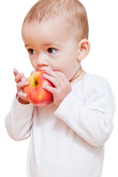 女婴吃健康食品隔离 免版税图库照片