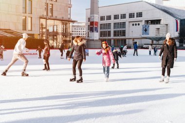 Slovakia.Bratislava.28.12.2018 .Outdoor.Winter sport.People ice skating on the City Park Ice Rink in Europe. Enjoying winter outdoor activities.