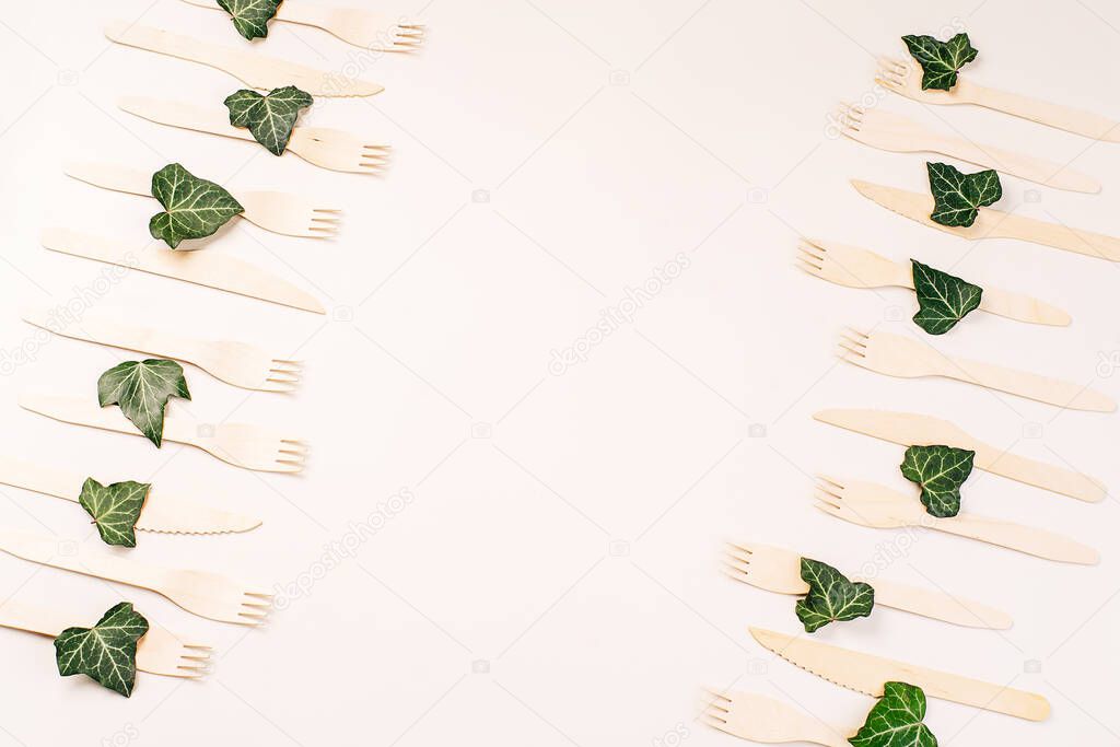 Banner eco friendly disposable kitchenware utensils on white background.Wooden forks,spoons,zero waste.Copy space.Eco friendly wooden cutlery.plastic free concept.Disposable wooden cutlery.Eco concept