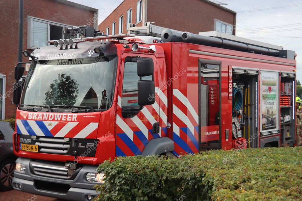 Firefighters at an fire in a mental healtcare organization in Rotterdam Nesselande in the Netherlands