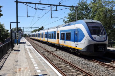 SLT train arriving at the train station of Nieuwerkerk aan den IJssel in the Netherlands