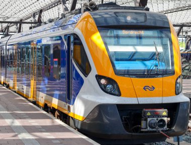 Caf Civity SNG local springer commuter train along platform of Rotterdam Central Station in the Netherlands