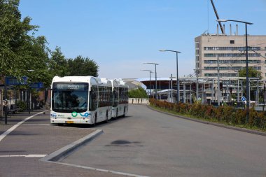 Electrical busses of Keolis charging and waiting at Zwolle bus station in the Netherlands