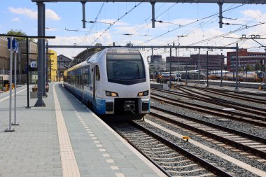 Keolis Blauwnet Stadler Flirt local commuter sprinter train at the railway station of Zwolle in The Netherlands