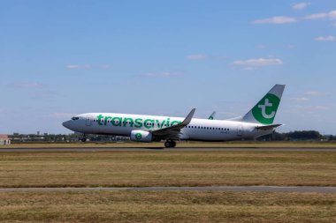 PH-HSJ Boeing 737-800  Transavia	 departing from Amsterdam Schiphol Airport at Polderbaan in the Netherlands