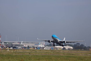 PH-AKD KLM Royal Dutch Airlines Airbus A330-303 departing from Amsterdam Schiphol Airport at Aalsmeerbaan in the Netherlands