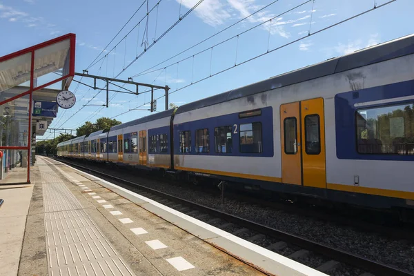 SLT local commuter train stopping at station Nieuwerkerk aan den IJssel in the Netherlands