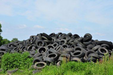 France, pile of waste tires in Arthies clipart