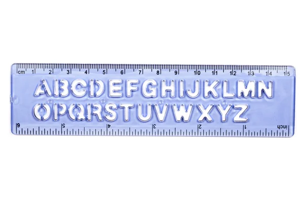 Plastic ruler and stencil — Stock Photo, Image