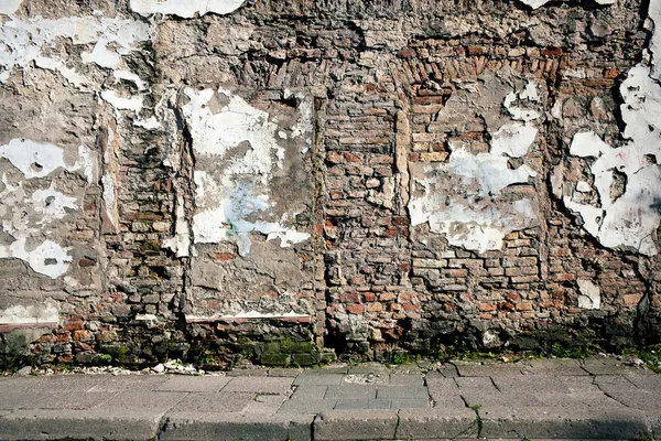 Old wall with immured door — Stock Photo, Image