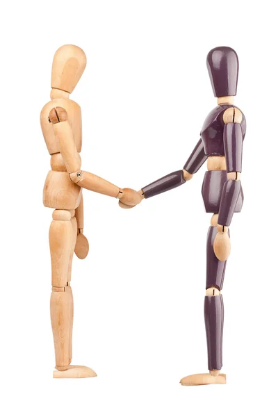 Wooden dummies shaking hands — Stock Photo, Image