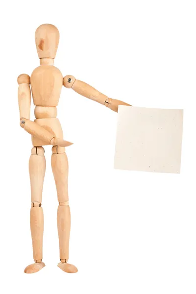 Wooden dummy holding paper — Stock Photo, Image