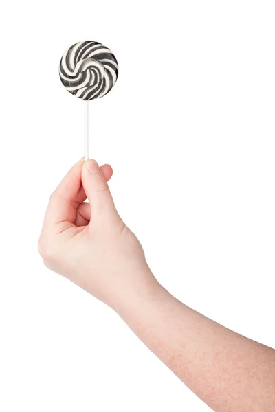 Hand holding lollipop — Stock Photo, Image