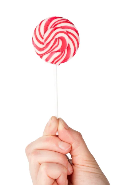 Spiral lolipop tutan el — Stok fotoğraf