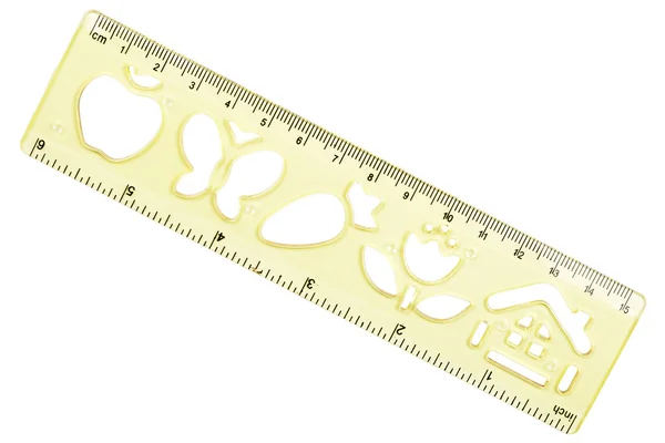 Plastic ruler and stencil — Stock Photo, Image