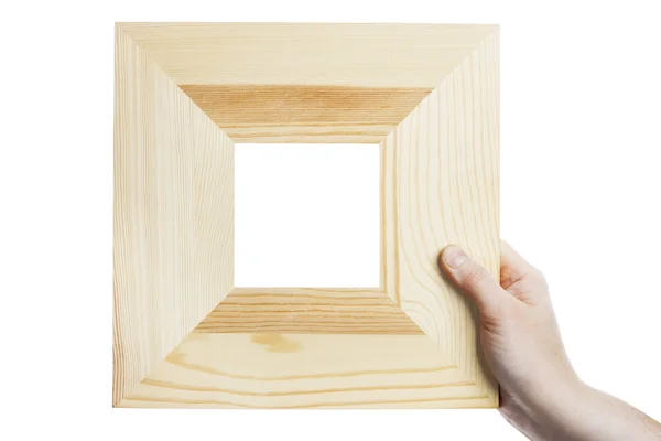 Wooden frame in hand — Stock Photo, Image