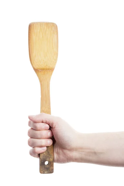 Hand holding kitchen spatula — Stock Photo, Image