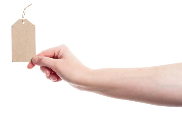 Hand holding cardboard tag — Stock Photo, Image