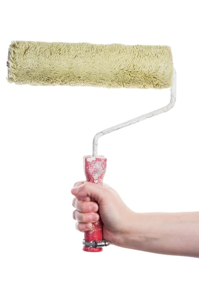 Hand holding paint roller — Stock Photo, Image