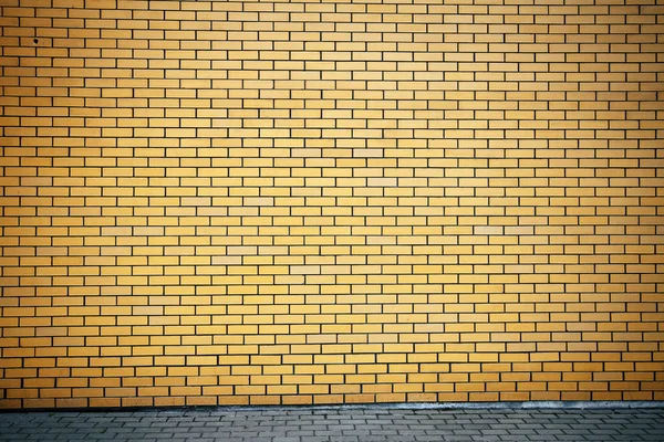 Pared de ladrillo amarillo vibrante — Foto de Stock