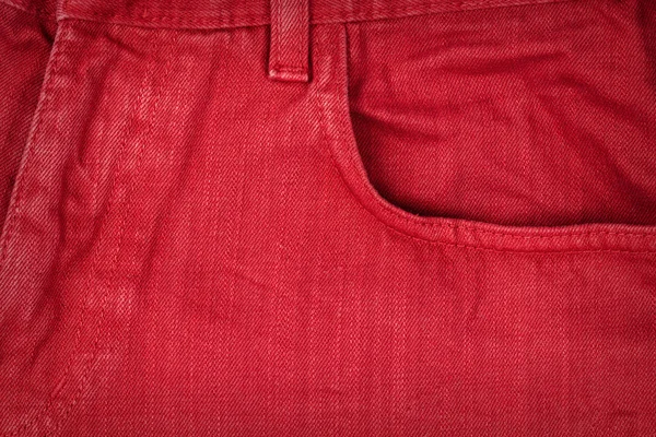 Röda jeans tyg med ficka — Stockfoto