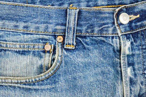 Tecido de jeans azul com bolso — Fotografia de Stock