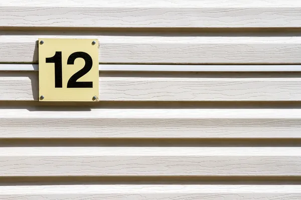 Numer 12 na ścianie — Zdjęcie stockowe