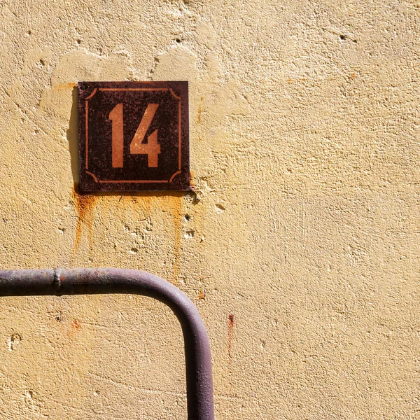 Numer 14 na ścianie — Zdjęcie stockowe