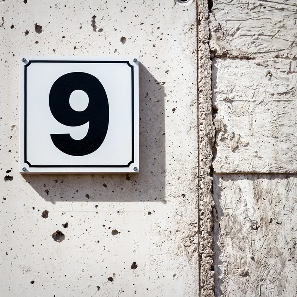 Number 9 on a wall — Stock Photo, Image