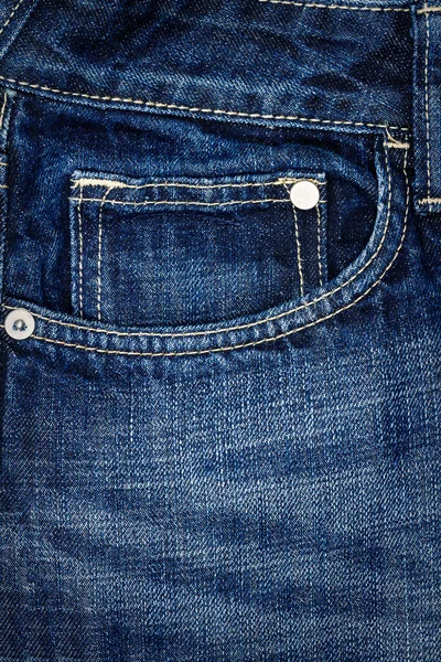 Tecido de jeans azul escuro com bolso — Fotografia de Stock