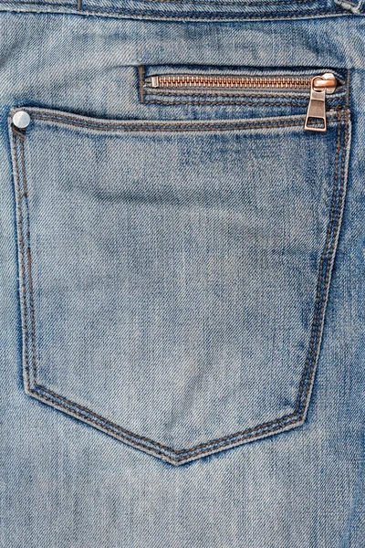 Ткань из синих джинсов с молнией — стоковое фото
