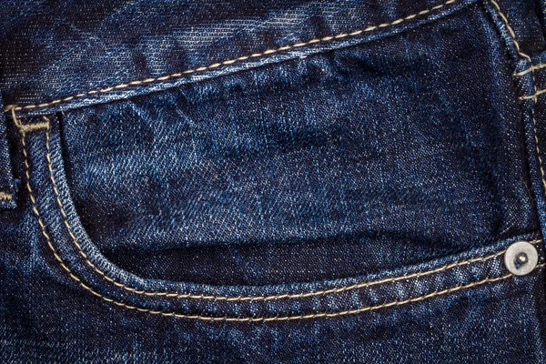 Dark blue jeans fabric with pocket — Stock Photo, Image