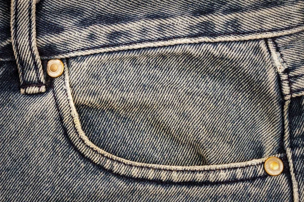 Tecido de jeans azul com bolso — Fotografia de Stock